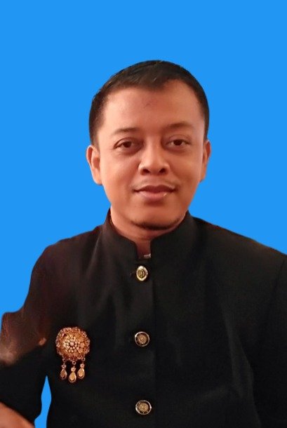 Yerizal, S.Pt, M.M.